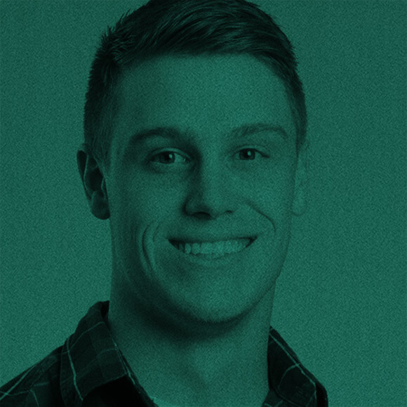 headshot of Jordan Wright with teal overlay